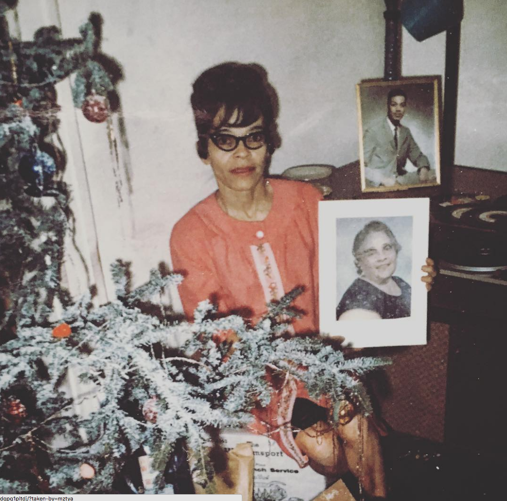 Nana (Grandmother) Holding image of Great Grandmother, Baltimore