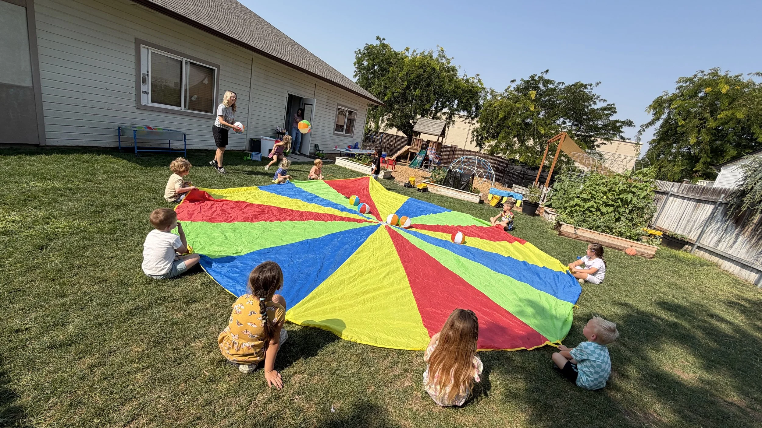 Parachute outdoor play preschool is important