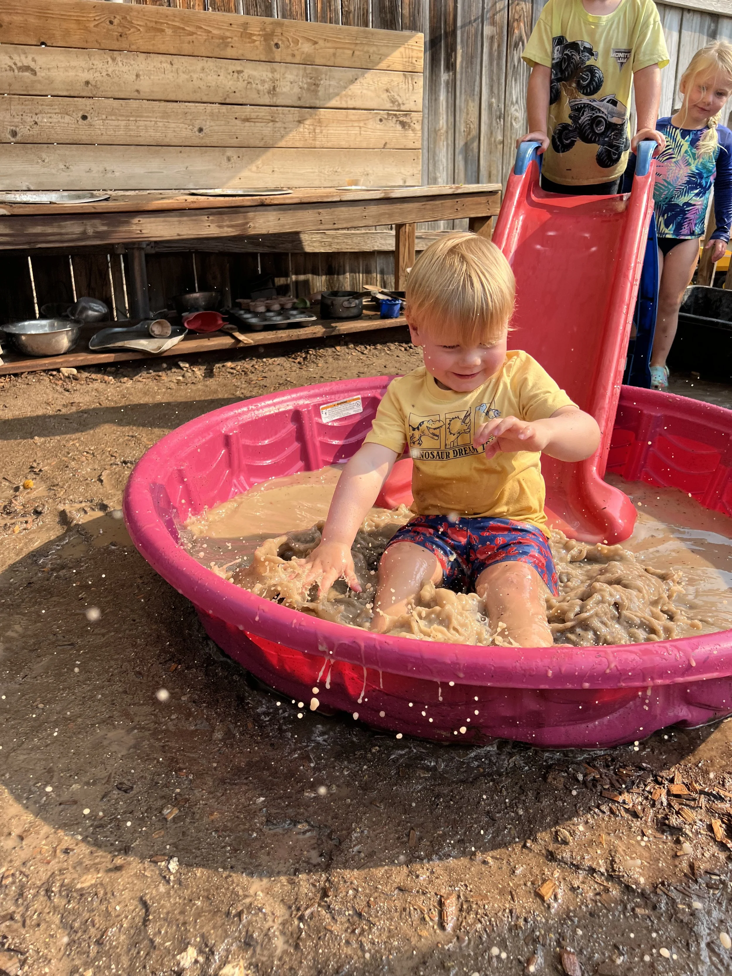 Outdoor play mud kitchen outdoors boise daycare childcare preschool in Idaho
