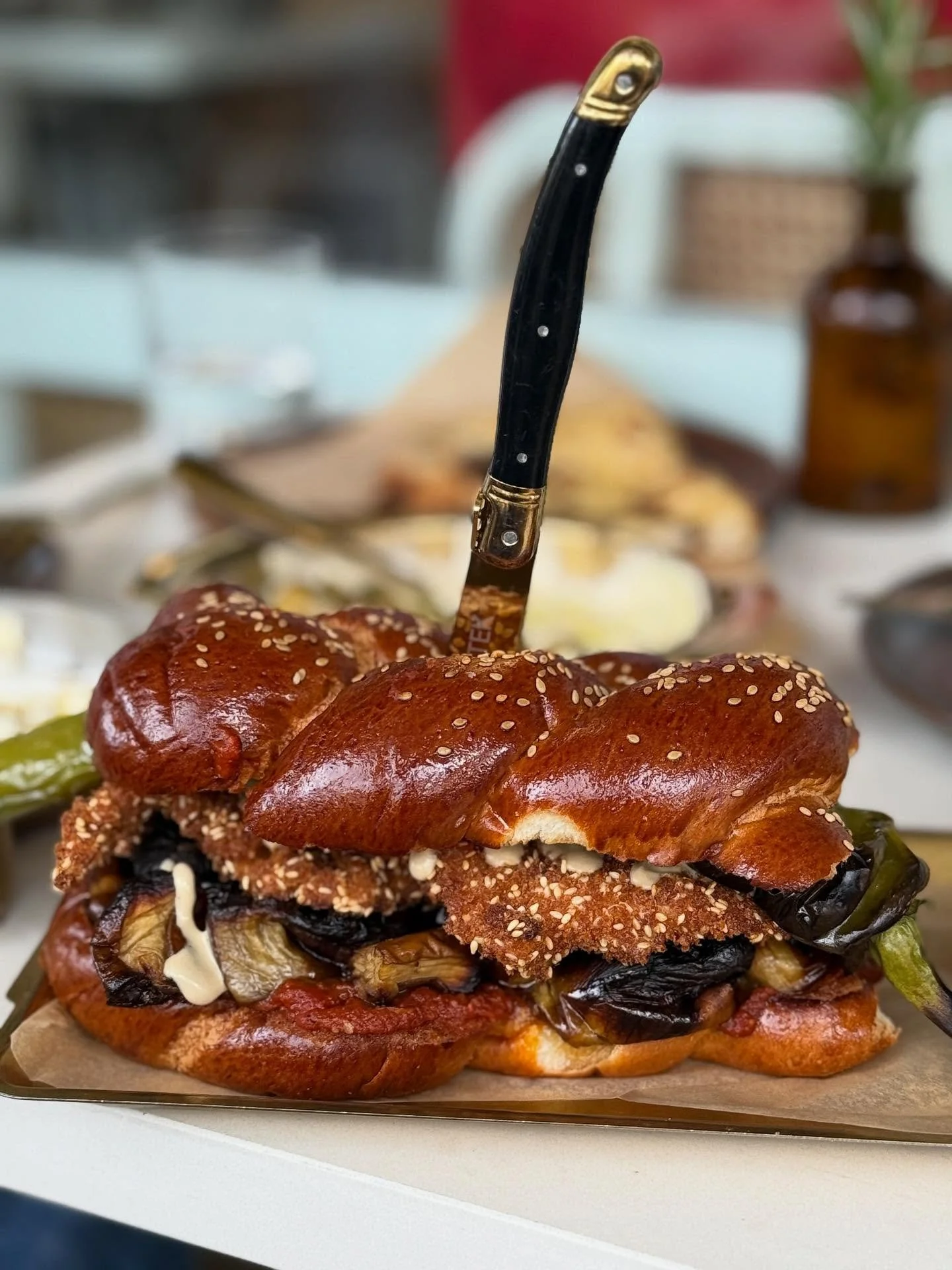 Lunch at @motekcafe at 27th and Collins and spotted this incredible sandwich at the table next to us!
Not even sure what it is&hellip; but so yummy looking.
Thank you to Dad &amp; Daughter for letting me take pic for @miabites 

#motek #israelifood #