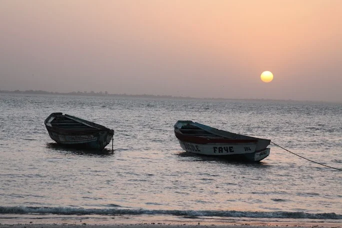  Pirogue boats on the seaport of Barra, Gambia.&nbsp; 
