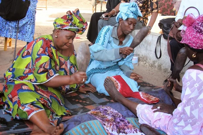  Women ironing textiles at a tie dye factory. | Banjul, Gambia&nbsp; 