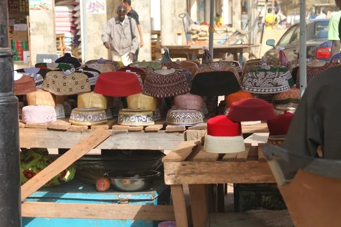  Kufi hats at a marketplace. | Banjul, Gambia&nbsp; 