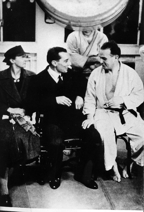 Feldenkrais with Marie Curie and Frédéric Joliot Curie in Paris in the 1930s. Feldenkrais's deep backgrounds in science and the martial arts both influenced his method.