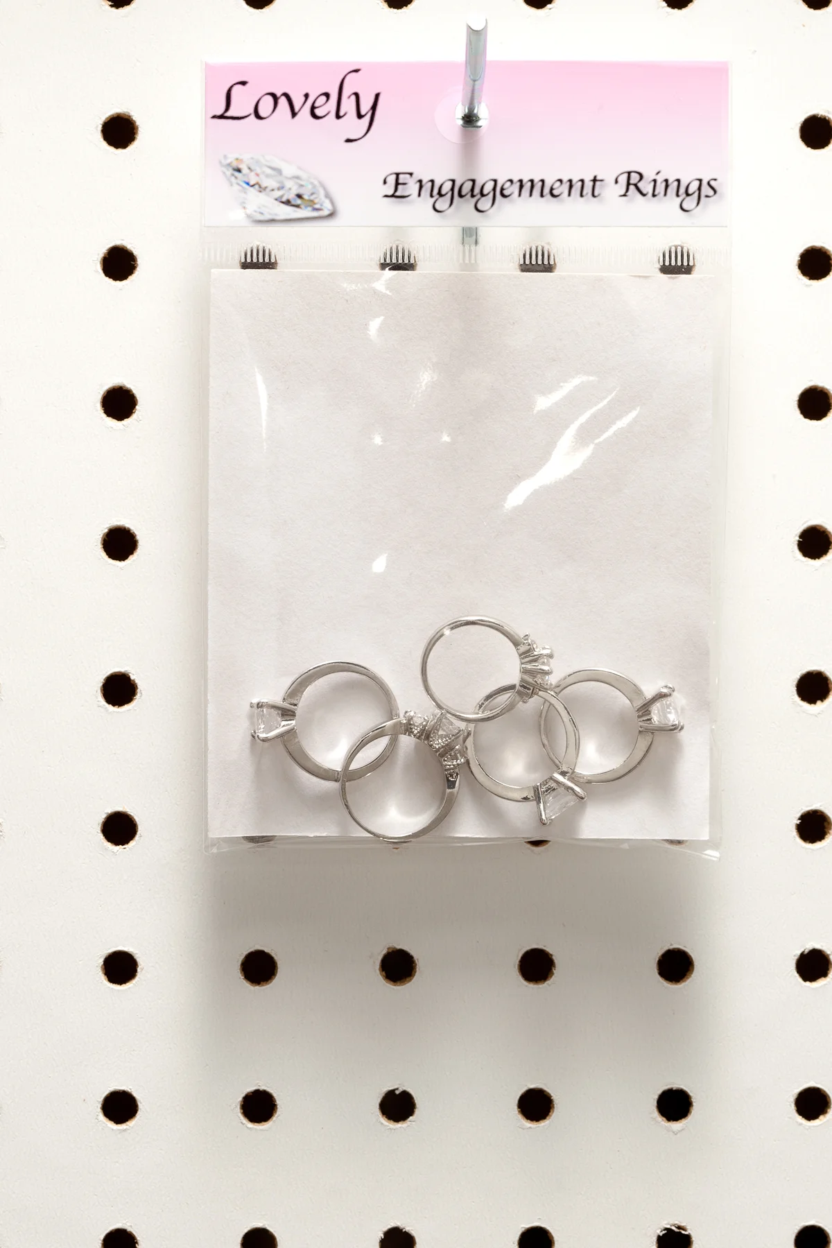 I haven't actually figured out how the guy who would buy a five pack of engagement rings would use them. Is he hedging? Planning real long term? Polygamist?