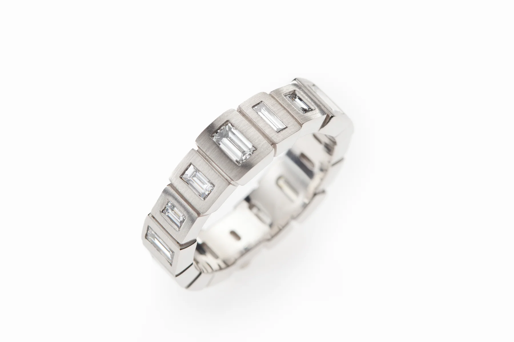 LUCIR: Diamond Baguette Eternity Ring in Platinum.