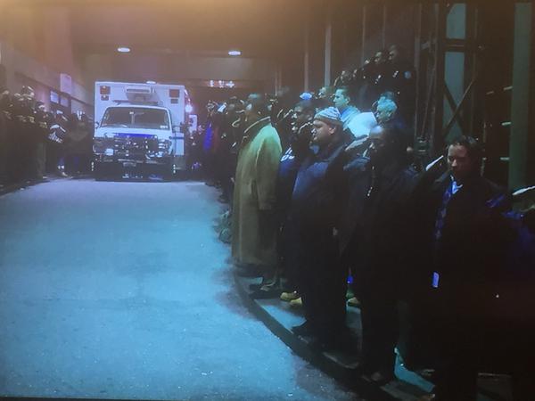 NYPD Patrol men line up and salute their two fallen comrades who were executed in Brooklyn