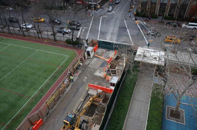 A dump runs through it. the truck access ramp will bisect asphalt green leaving a soccer field on one side and a toddlers playground on the other