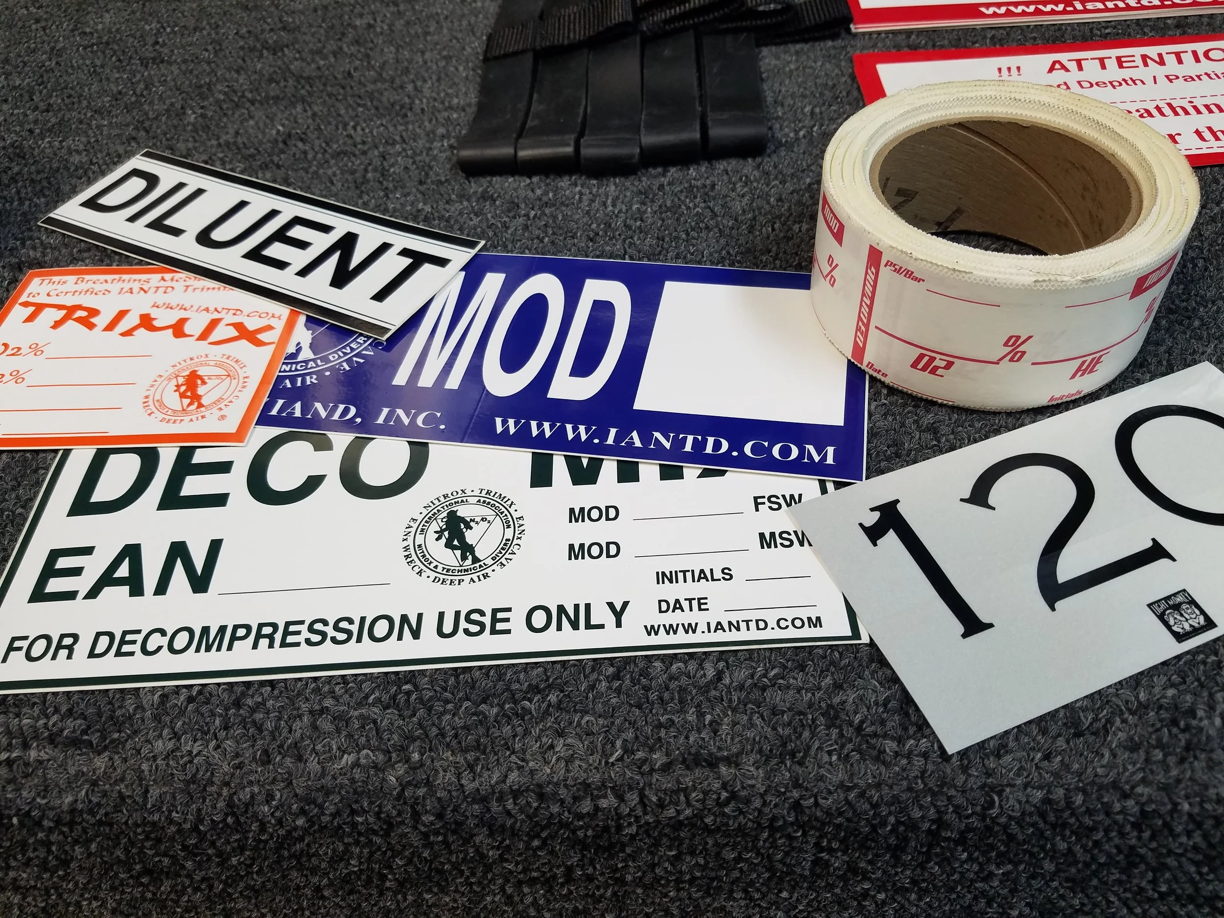 Labels for cylinders exist in many forms, at a minimum, a label with the percentage of oxygen and helium and the MOD should be in a spot on the cylinder clearly visible to all team members.