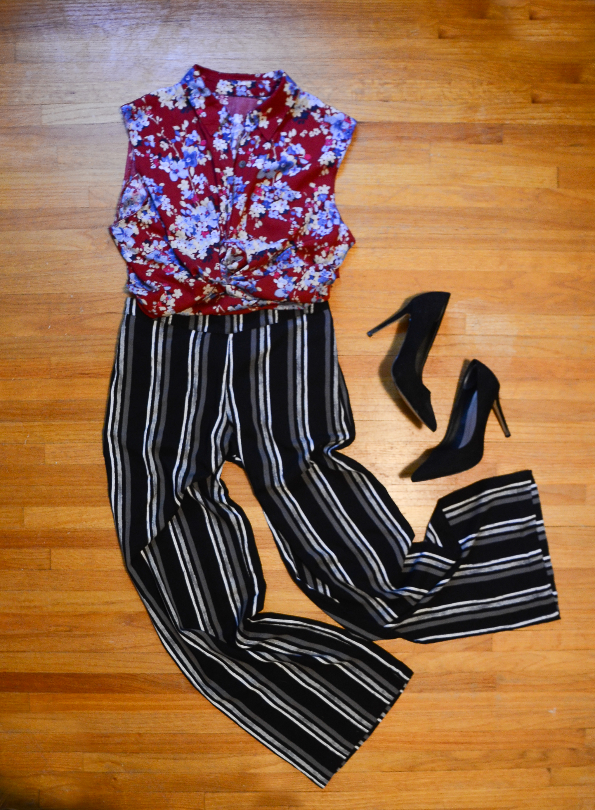A more work-appropriate look. Wide-leg striped pants with a floral top.
