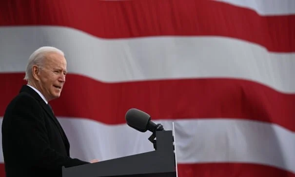 Biden returns US to Paris climate accord hours after becoming president