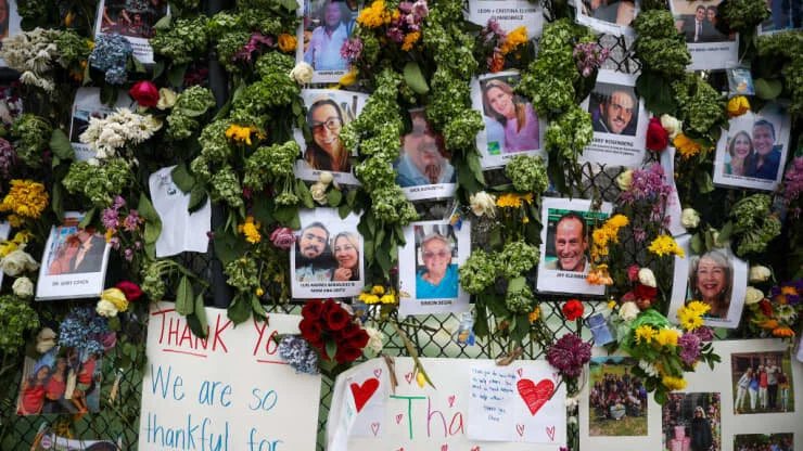 Death toll in Florida condo collapse rises to 28 as lightning forces another pause in the search