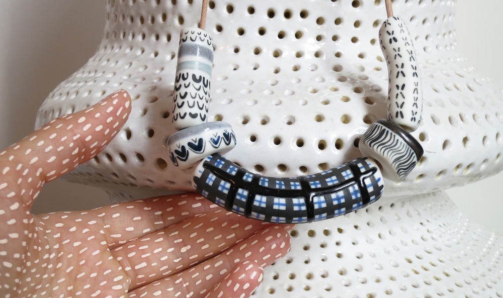 St Eloy one of a kind hand-painted necklaces (image courtesy of St Eloy)