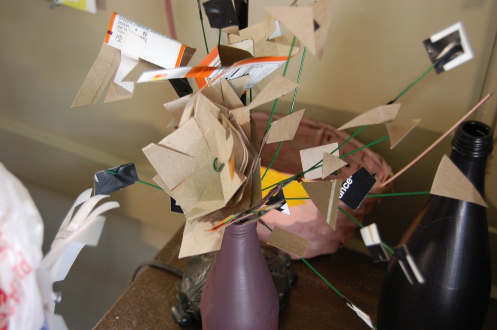 A cardboard flower arrangement in Jaik's studio 