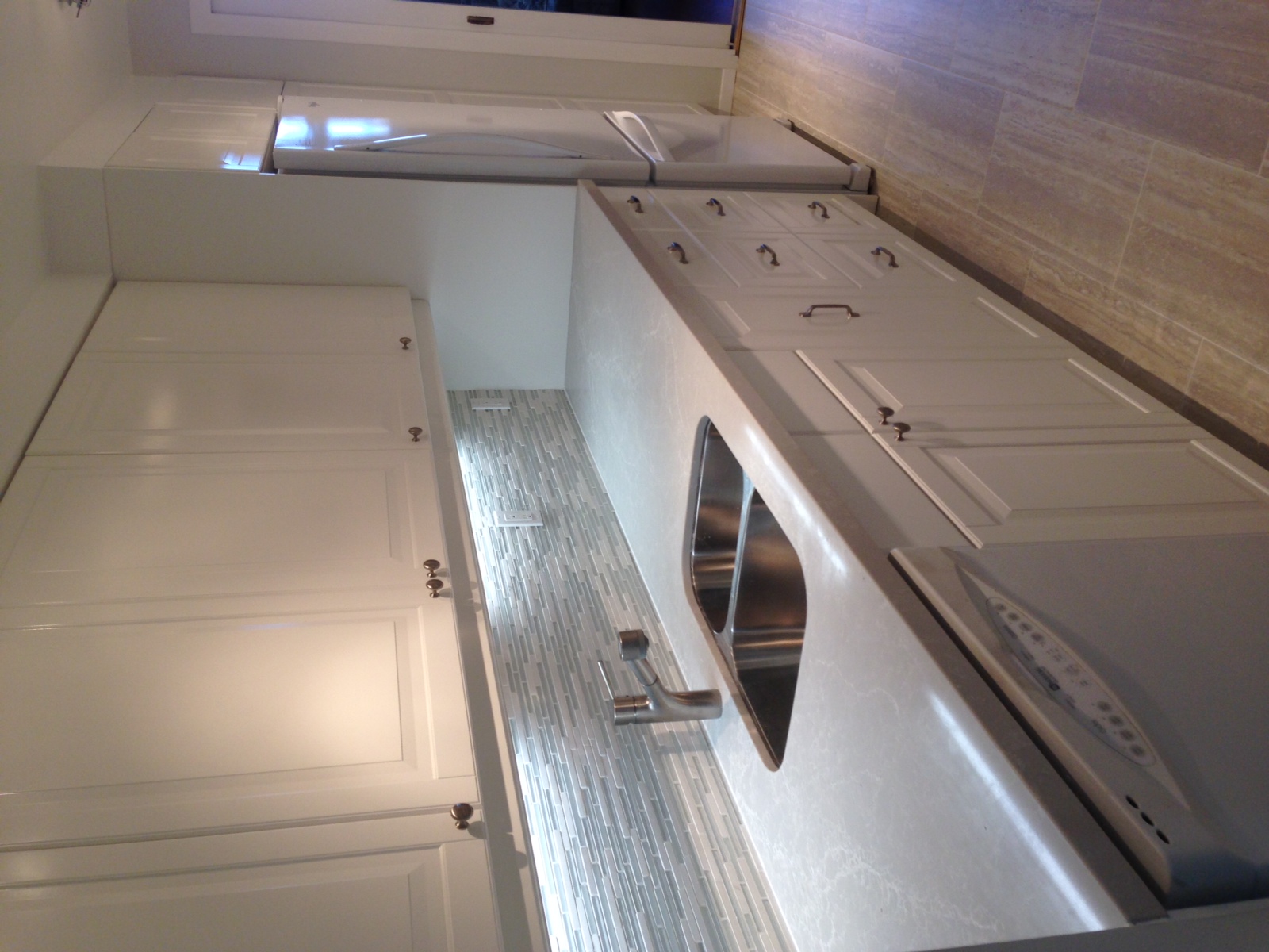 cabinets by Ikea/ tile by Saltillo Imports/ Caeserstone countertops by York Fabrica
