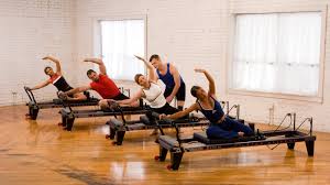 This is not the actual room, but this is what Pilates reformers look like. 