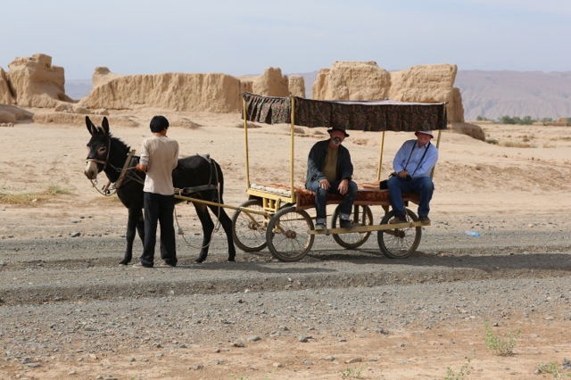   Cameraman Steve Arnold (l) and Andrew Caillard in the ancient city of Gaochang on the Silk Road, far-west China during one of our location surveys. The weather was scorchingly hot, in the 40’s. Grapes flourish here only because of ancient undergrou