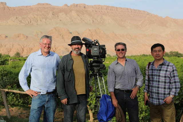   Flame Mountains, Turfan, Far West China. From L-R: Andrew Caillard MW, Steve Arnold (cameraman), myself (Warwick Ross, Producer:Co-Director), Demei Li (winner Decanter Wine Award). We would never have gained access to these sensitive regions where 