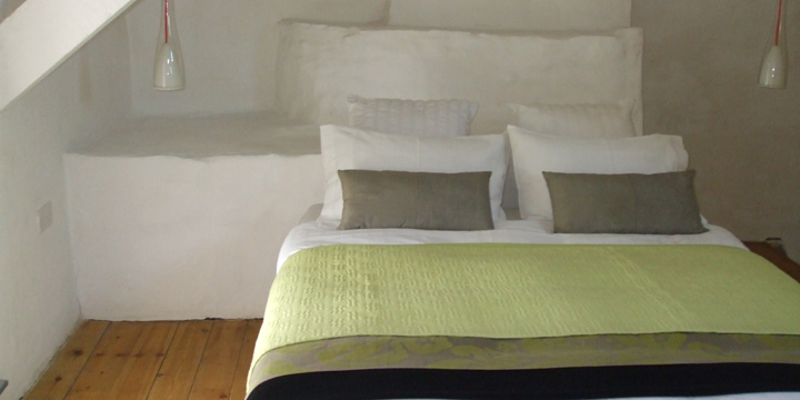 Master double bed upstairs with additional two single beds.