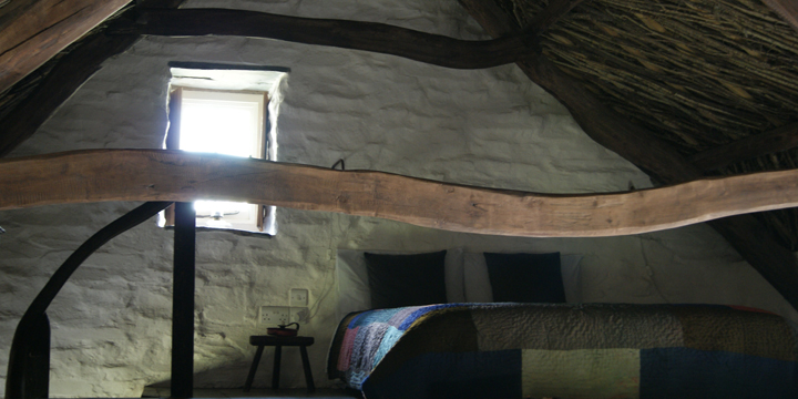 Master double bedroom on open plan mezzanine. 