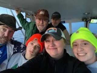 4:30am Salmon Fishing on Lake Michigan with Lakeshore Adventures and both of our Dad’s.