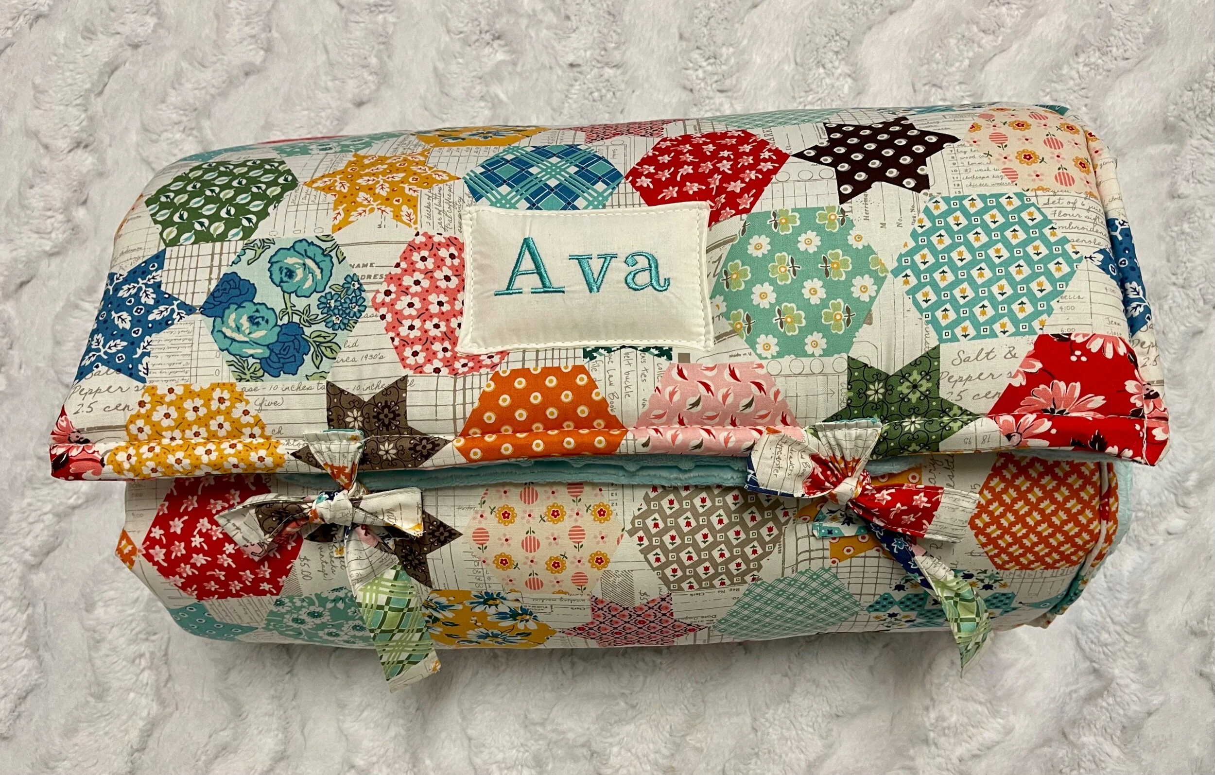 Janiebee Quilted Nap Mat Ava Patchwork Toddler Nap Mat brown, ivory, sage Cheater print to look like quilt top. Naps guaranteed from janiebee.com