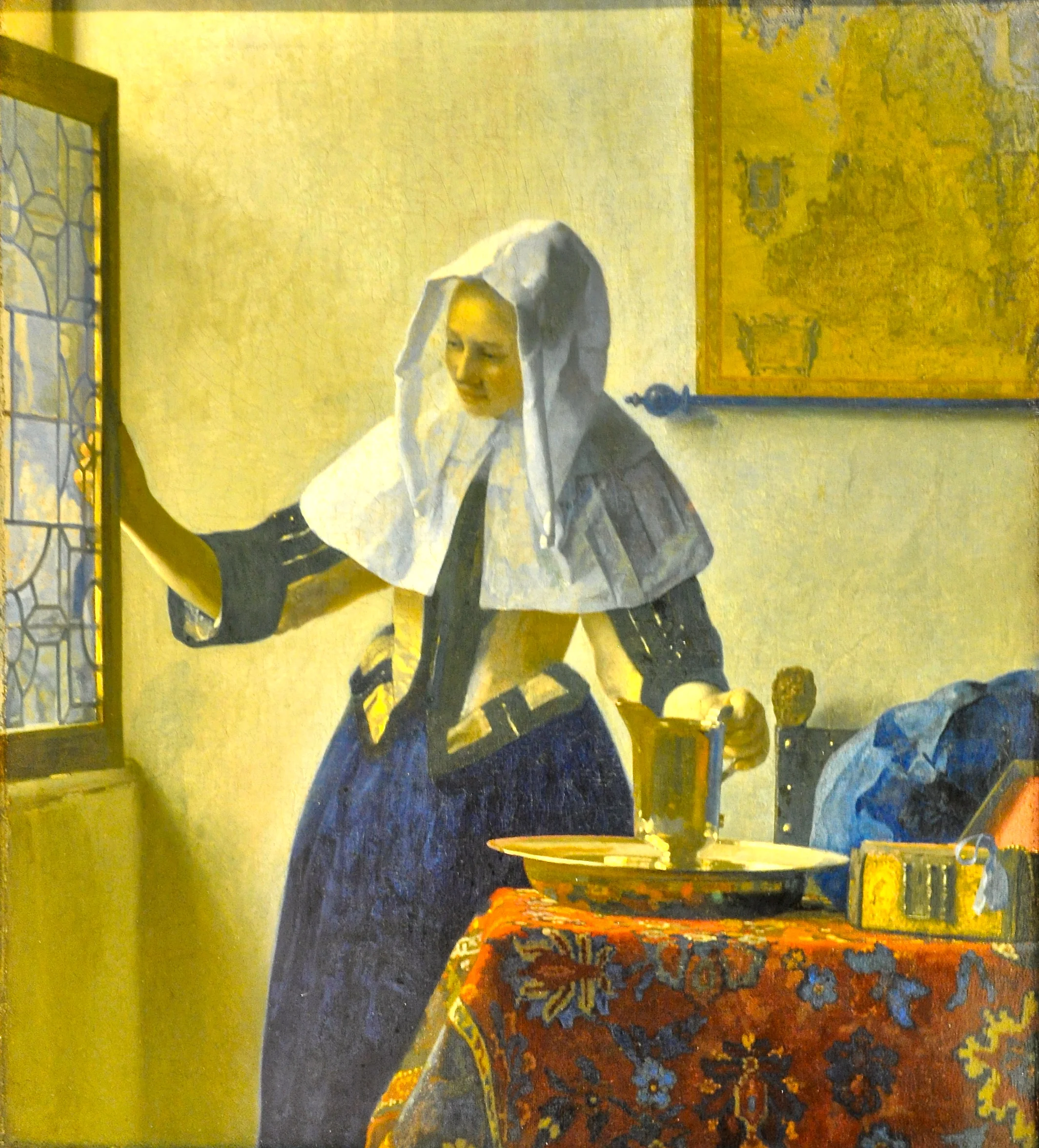 Young Woman with a Water Pitcher by Vermeer