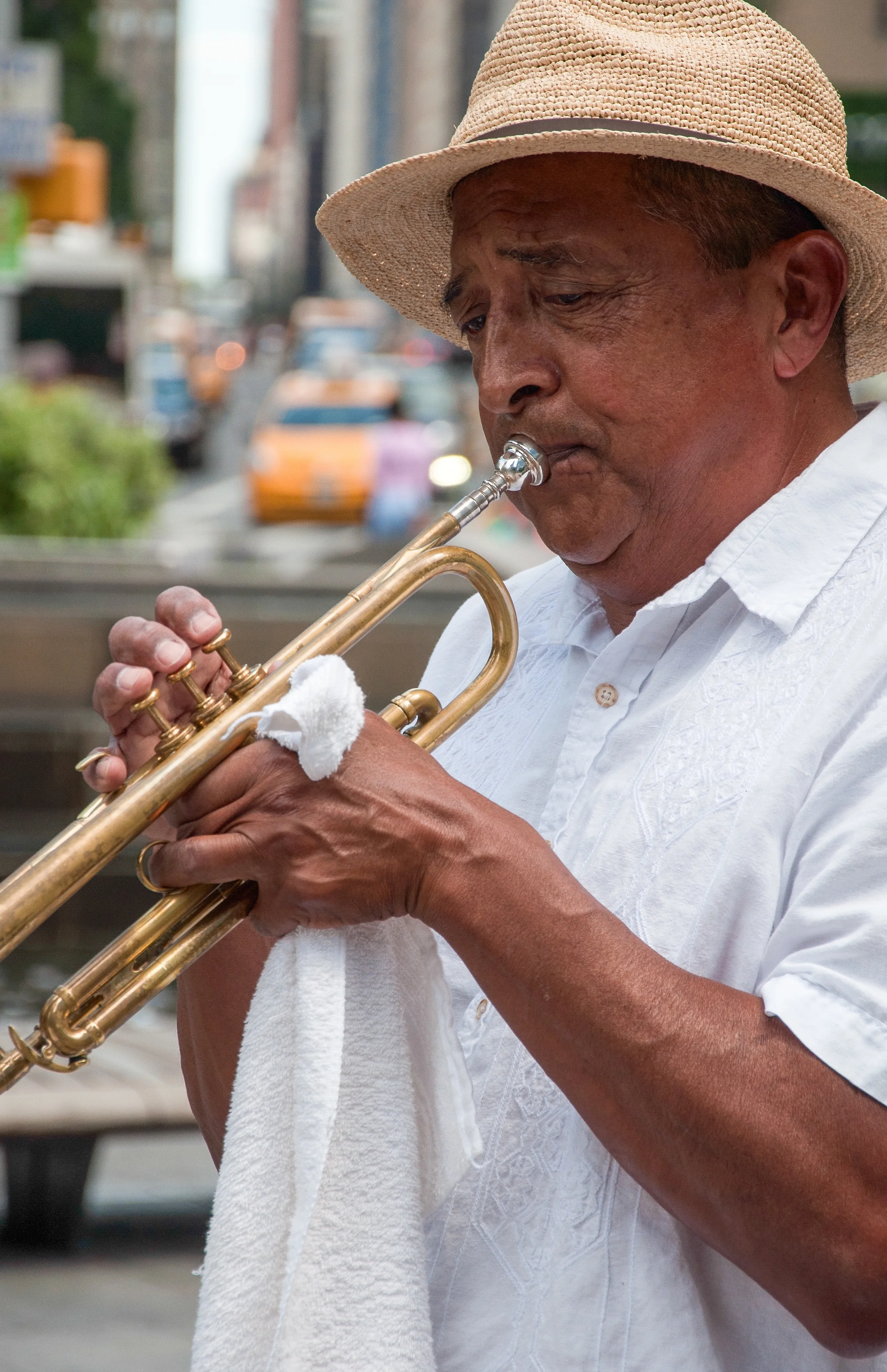  Eddie Jimenez of San Diego, California, blows his horn at Columbus Circle iin midtown Manhattan.&nbsp; 