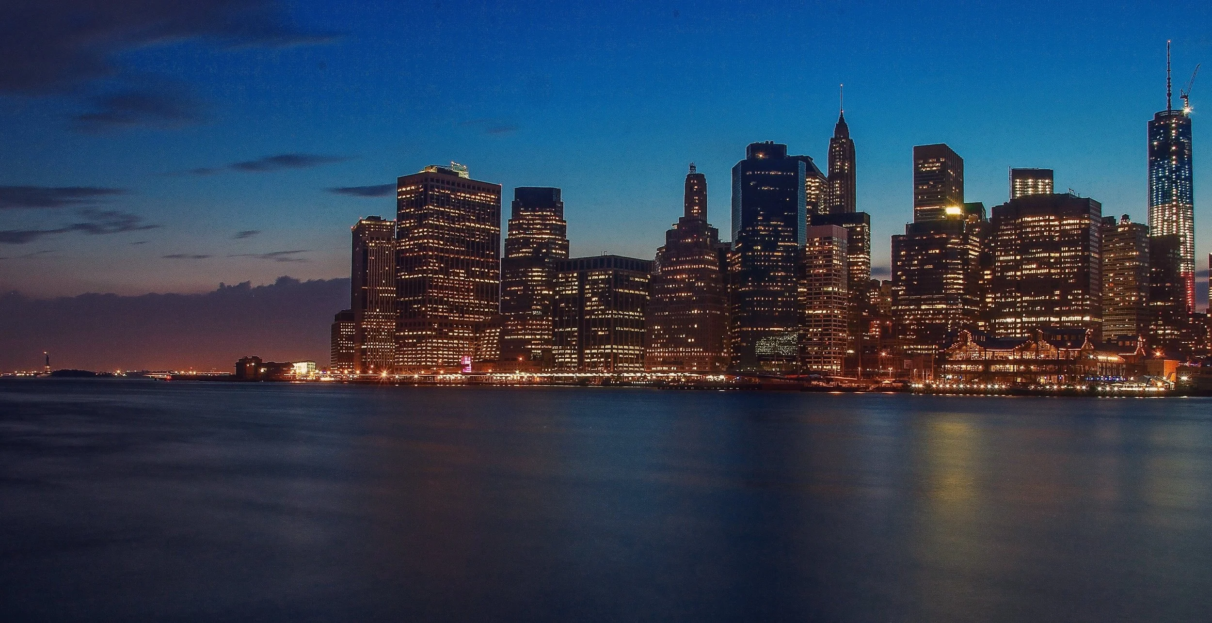   The night lights of the Lower Manhattan skyline on the East River.      (Photo: © Joseph Kellard/kellardmedia.com)  