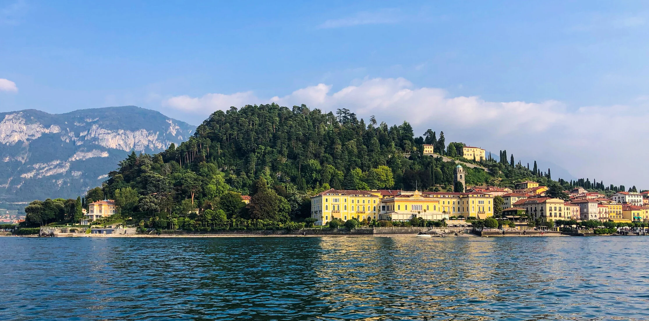  The Grand Hotel Villa Serbelloni lines the@shore in Bellagio⁠. I snapped this photo as our ferry approached the village on Lake Como in northern Italy.    (Photo: © 2019 Joseph Kellard/kellardmedia.com)⁠ 