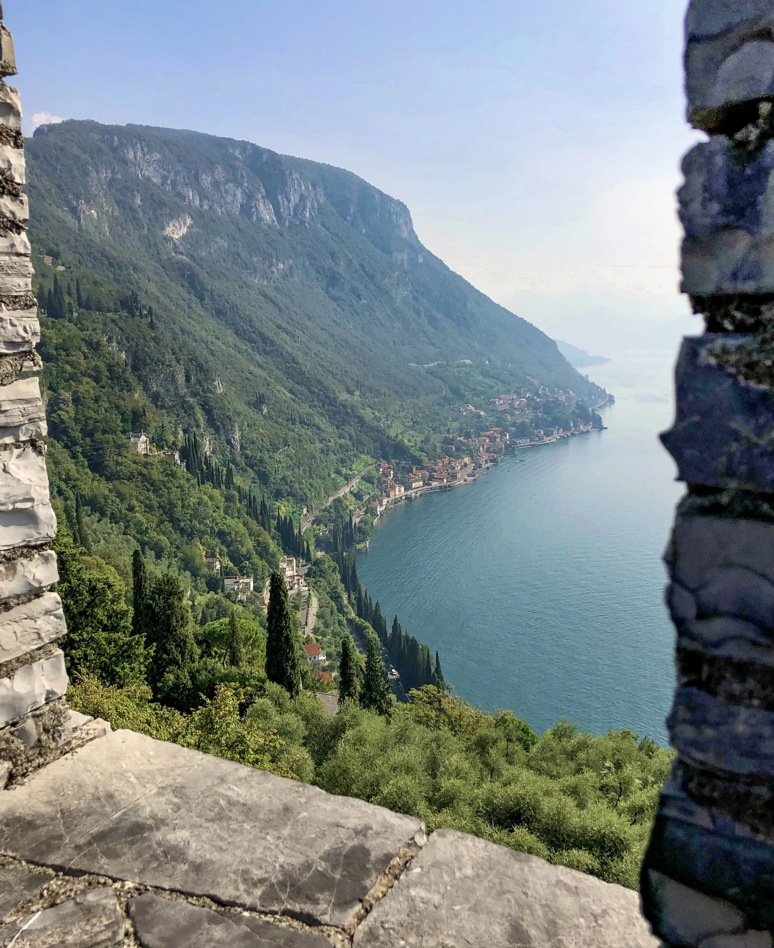  When I visited Varenna, a village on Lake Como  in northern Italy, I hiked up a mountain and climbed to the top  of the 12th-century Vezio Castle. From there, I took many  photos of the surrounding areas, including this birds-eye view  of the neighb