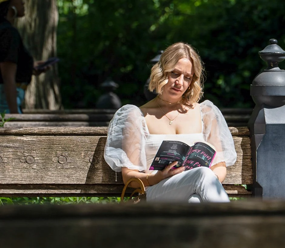  A mental note I’ve set for when I’m out wandering with my camera is to capture people reading, especially physical books. I don’t seek these people out, but when I cross paths with them I’m reminded to stop what I’m doing to snap a candid. Here’s a 