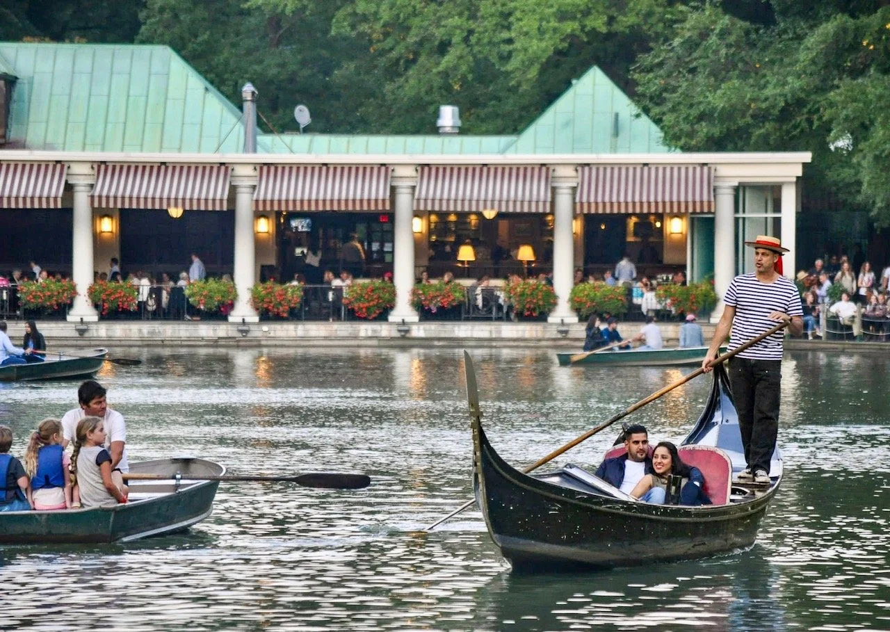  A couple rides a gondola near the Loeb Boathouse in Central Park.  