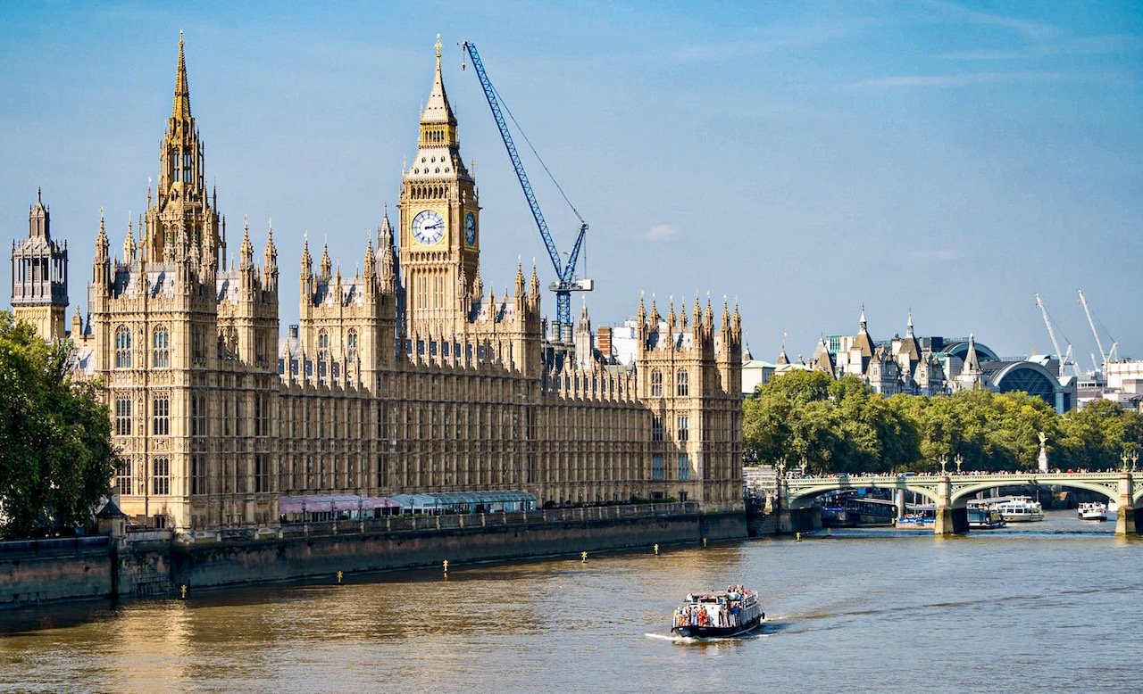 The Palace of Westminster, home to the Parliament of the United Kingdom, lines the north bank of the Thames River in London. The building is better known as the House of Parliament, where that body has met for more than 900 years. Most of the mediev