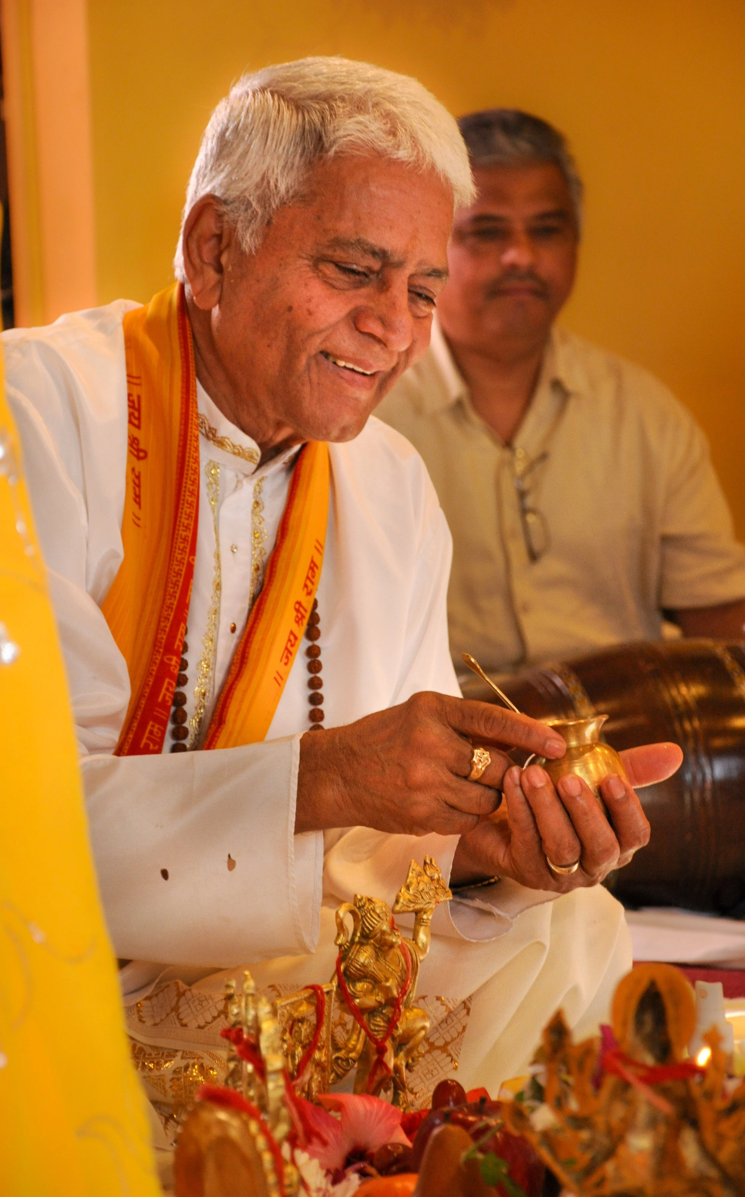   A Hindu priest performs a Sunday service at a temple in Long Beach, New York.   