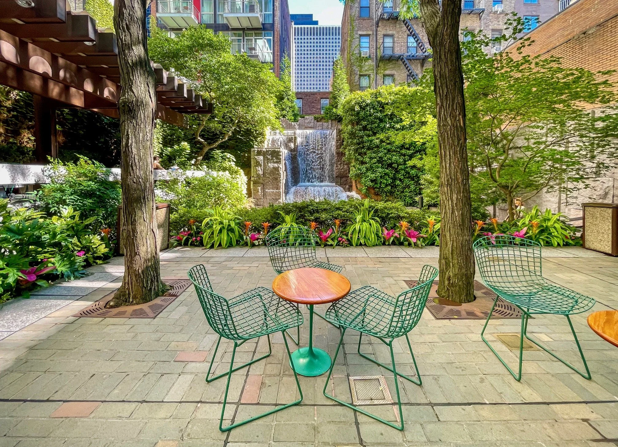  I have lived in New York almost my entire life, been all over Manhattan snapping photographs for many years now, yet I still find hidden gems. Last year, I discovered Greenacre Park, which has been tucked away on a side street in Manhattan for more 