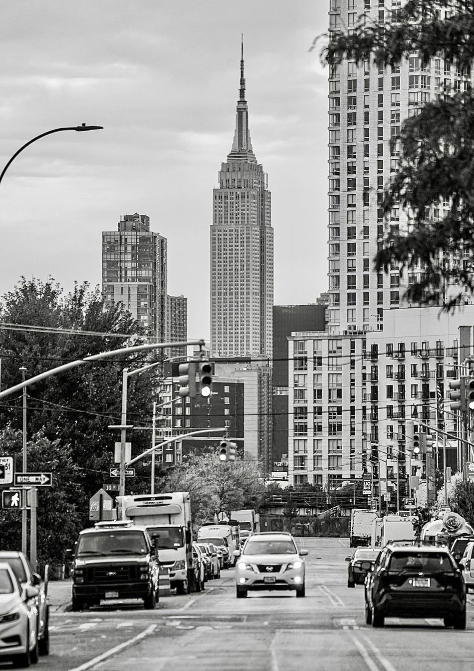  A joy of walking and driving around New York City with a camera is discovering new spots where the Empire State Building randomly peeks out, in all of its glory, in full or semi-full view. This vista is from the Long Island City-Sunnyside border in 