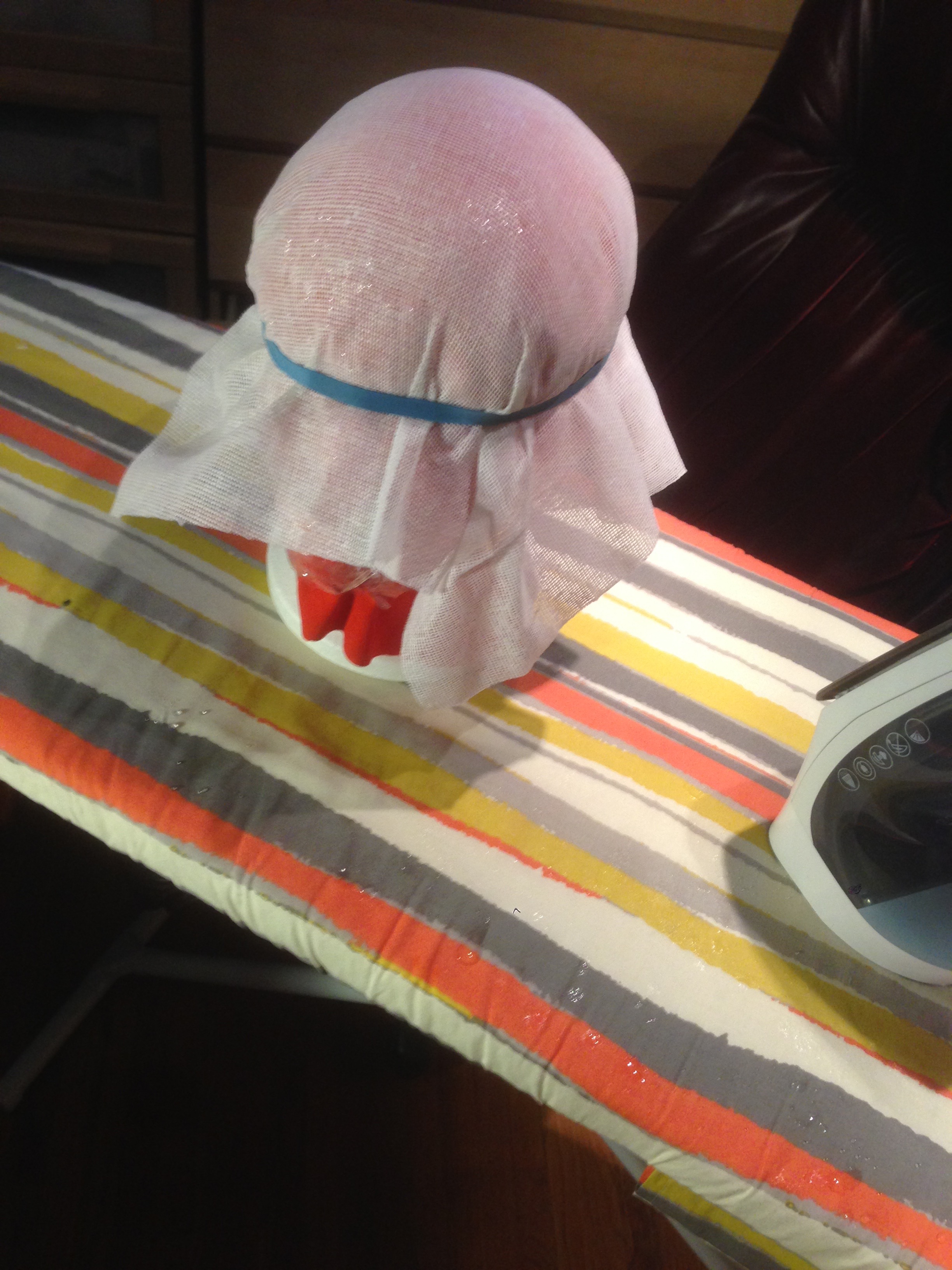 Wetting Buckram to Form the Crown