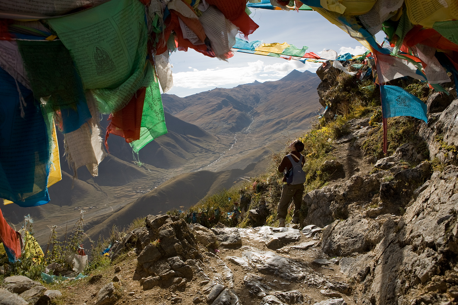  Helen Le, a visitor from England, walks the Ganden monastery kora. Walks around monasteries, temples, and other sacred sites, are a meditation. 