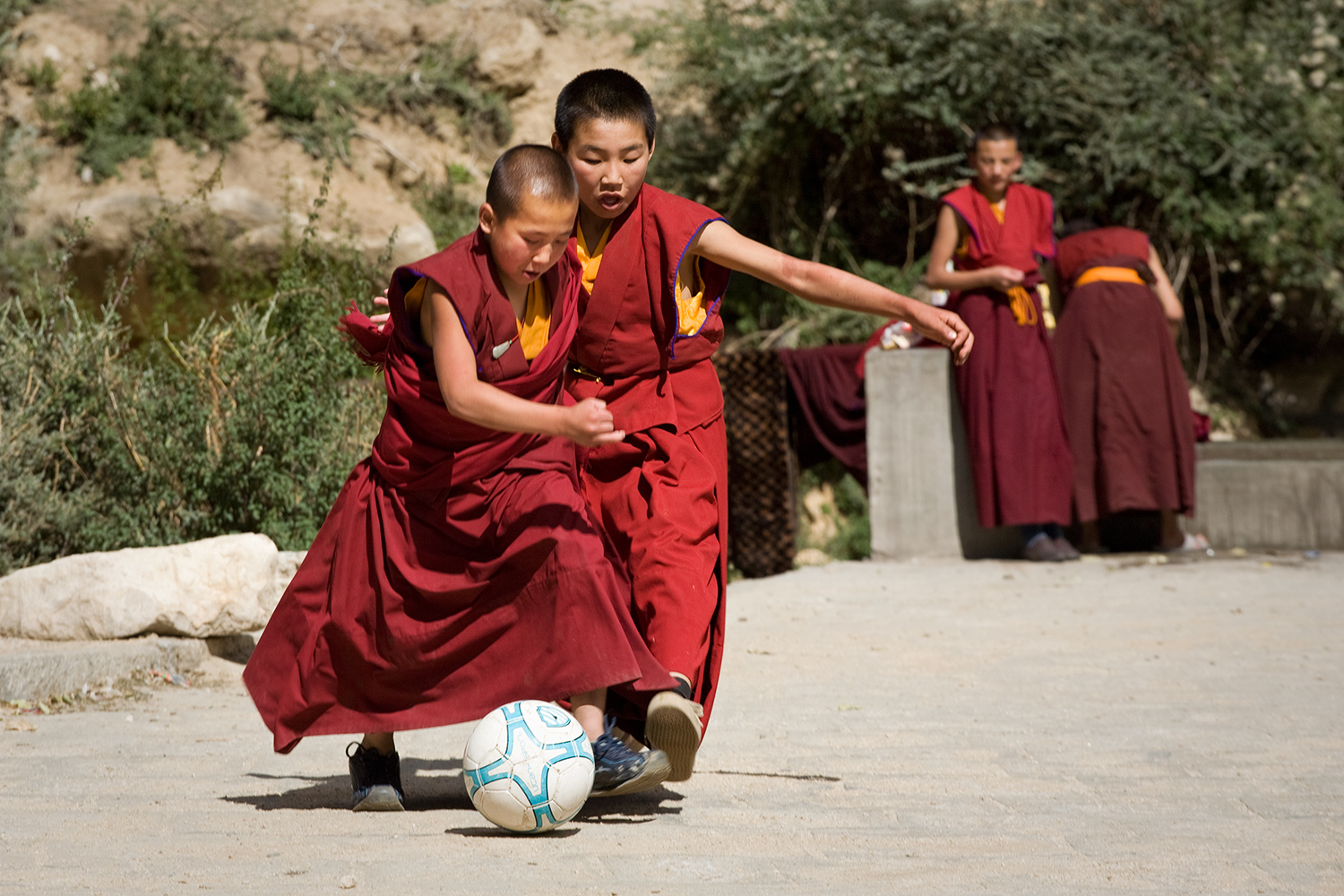  Young monks play at their monastery. 