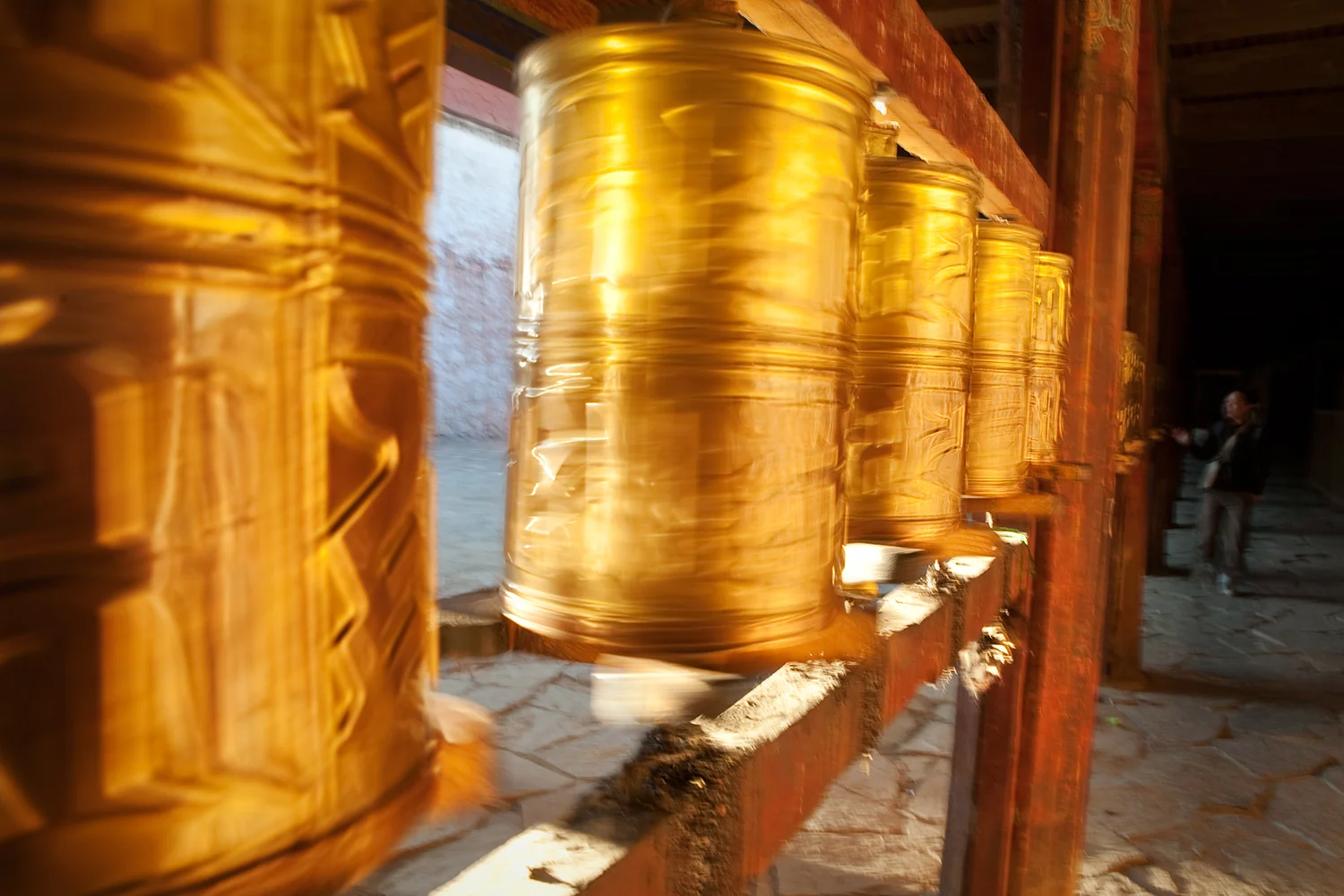 When a prayer wheel is spun, Tibetan Buddhists believe the mantra carved on it is activated.