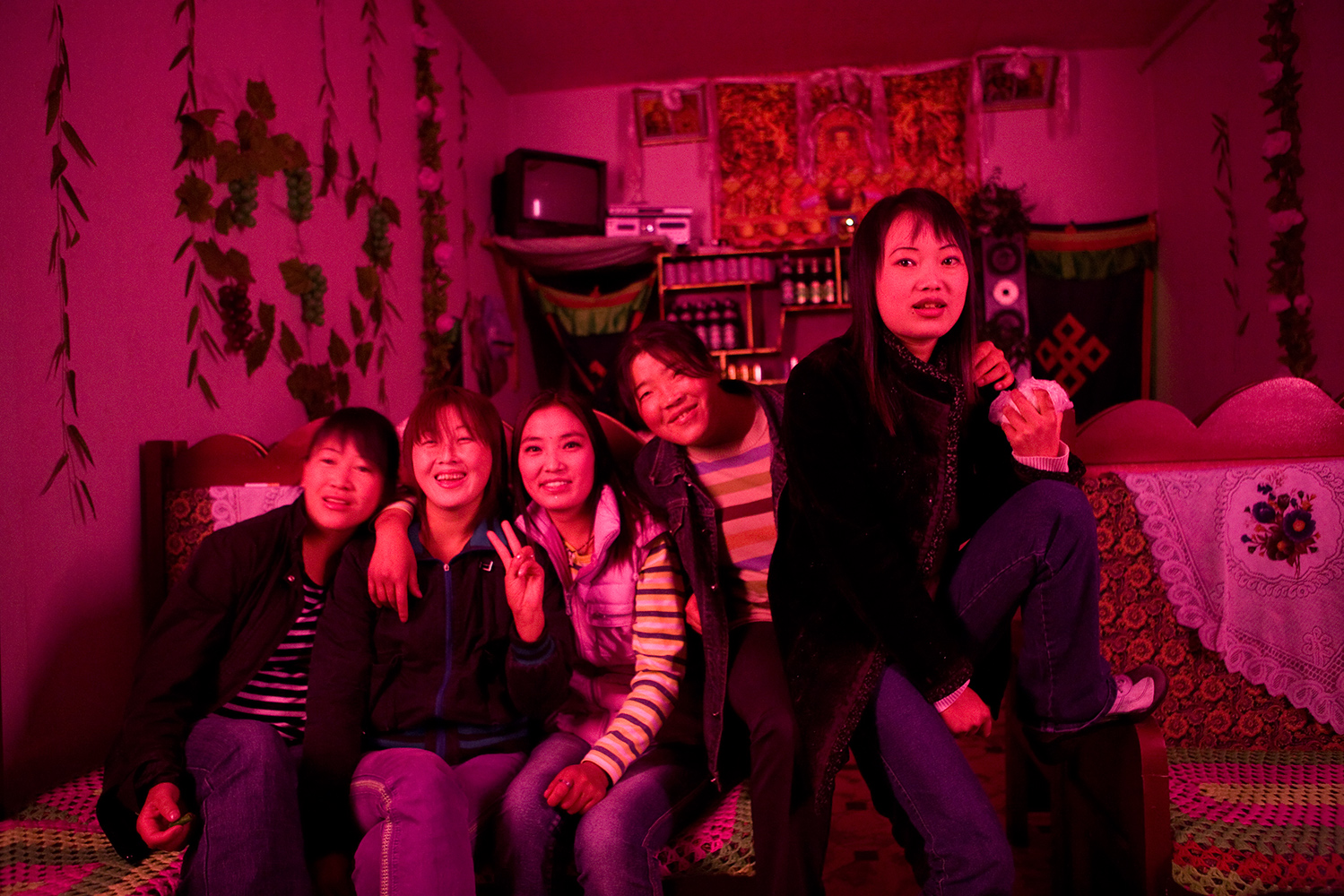  Women of the red light pose in Bayi, a Chinese town in Tibet whose name means “August 1,” or the day the People's Liberation Army was founded. The Chinese government forbade foreigners from visiting the town for many years, but now it is open for tr