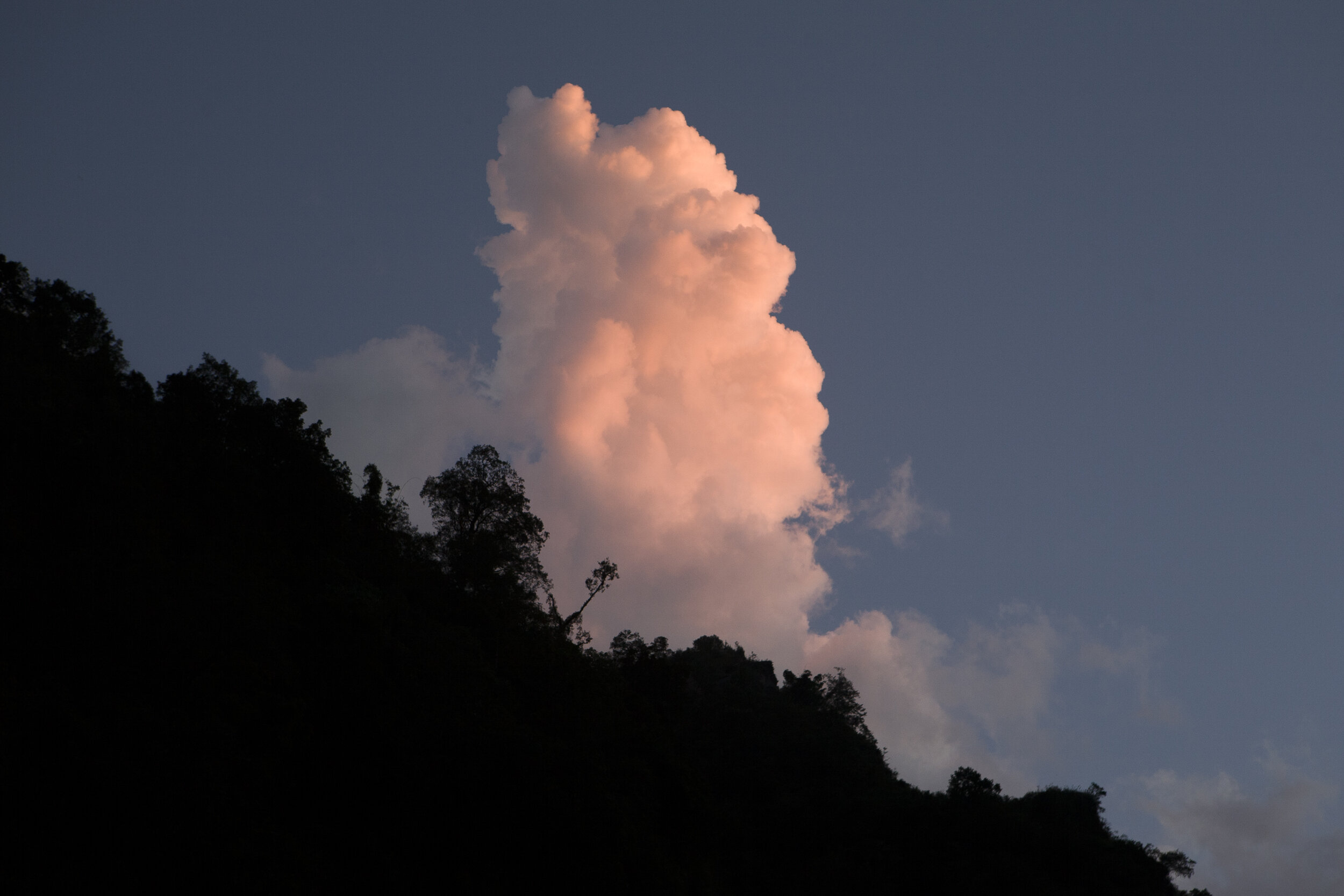  Clouds light up in the evening sun in Tatopani, Nepal. 