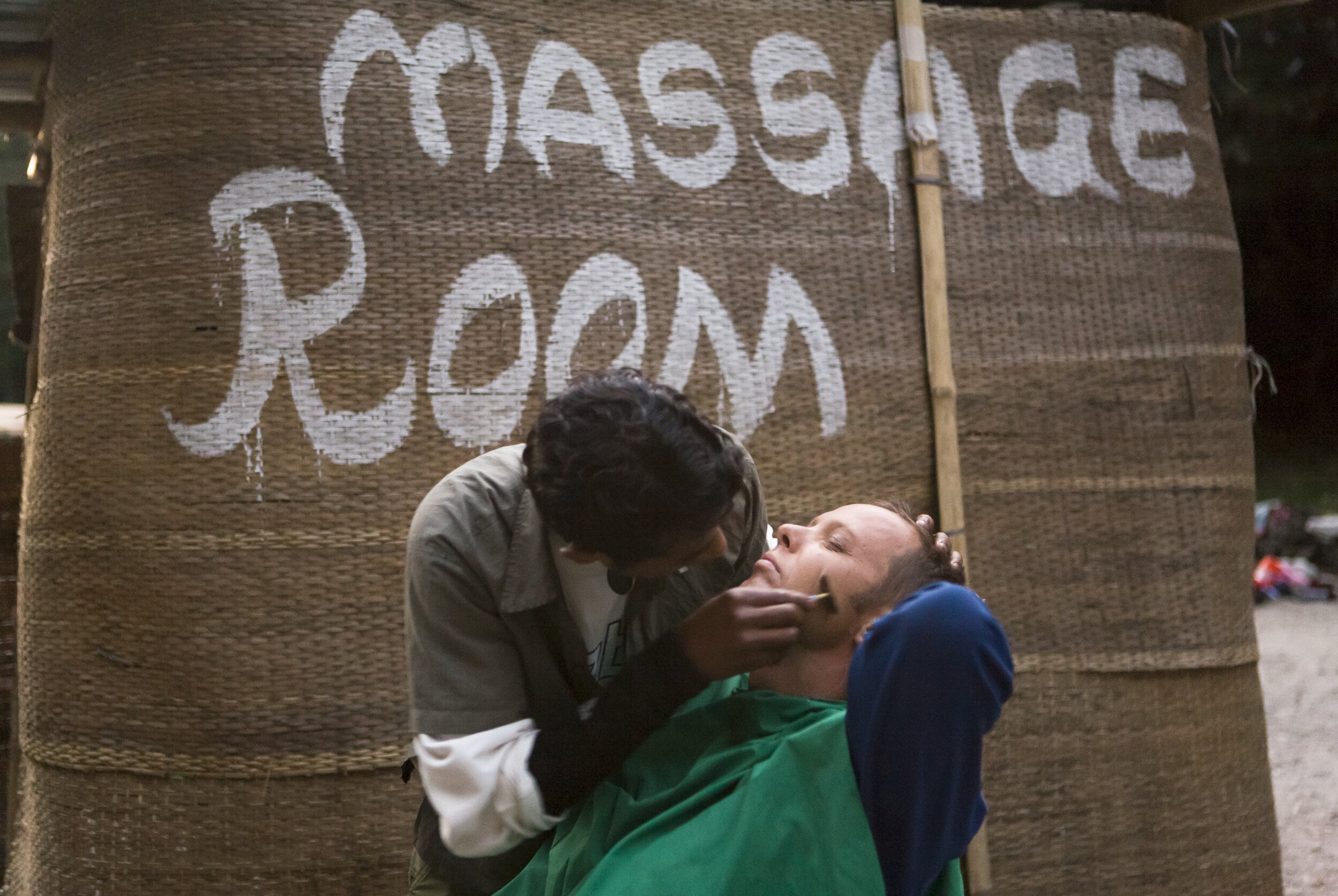  Dutch trekker Ron Tindal receives a shave near the hot springs of Tatopani on a rare rest day while traveling the Annapurna Circuit. 