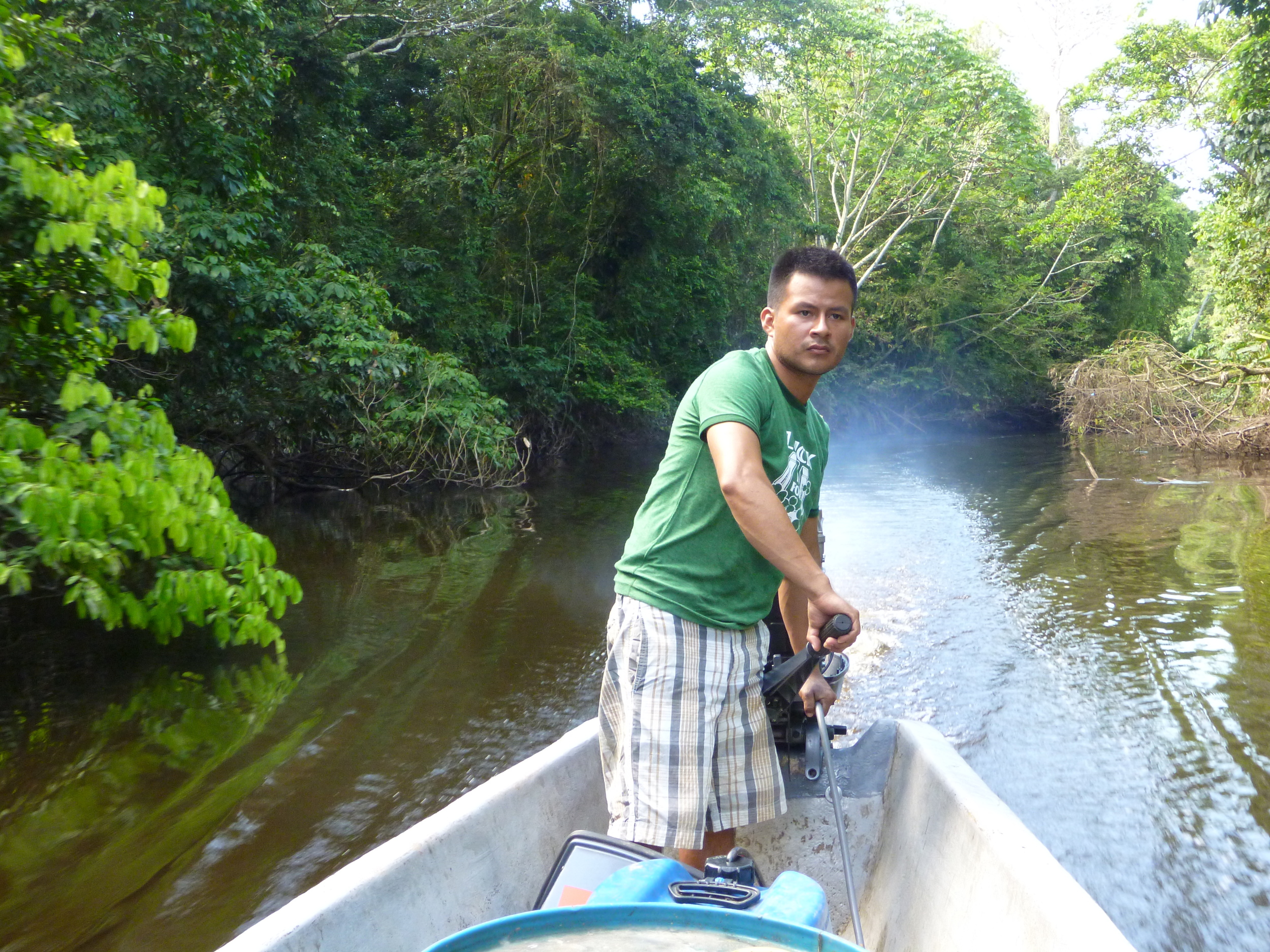 Hugo drives the boat.JPG