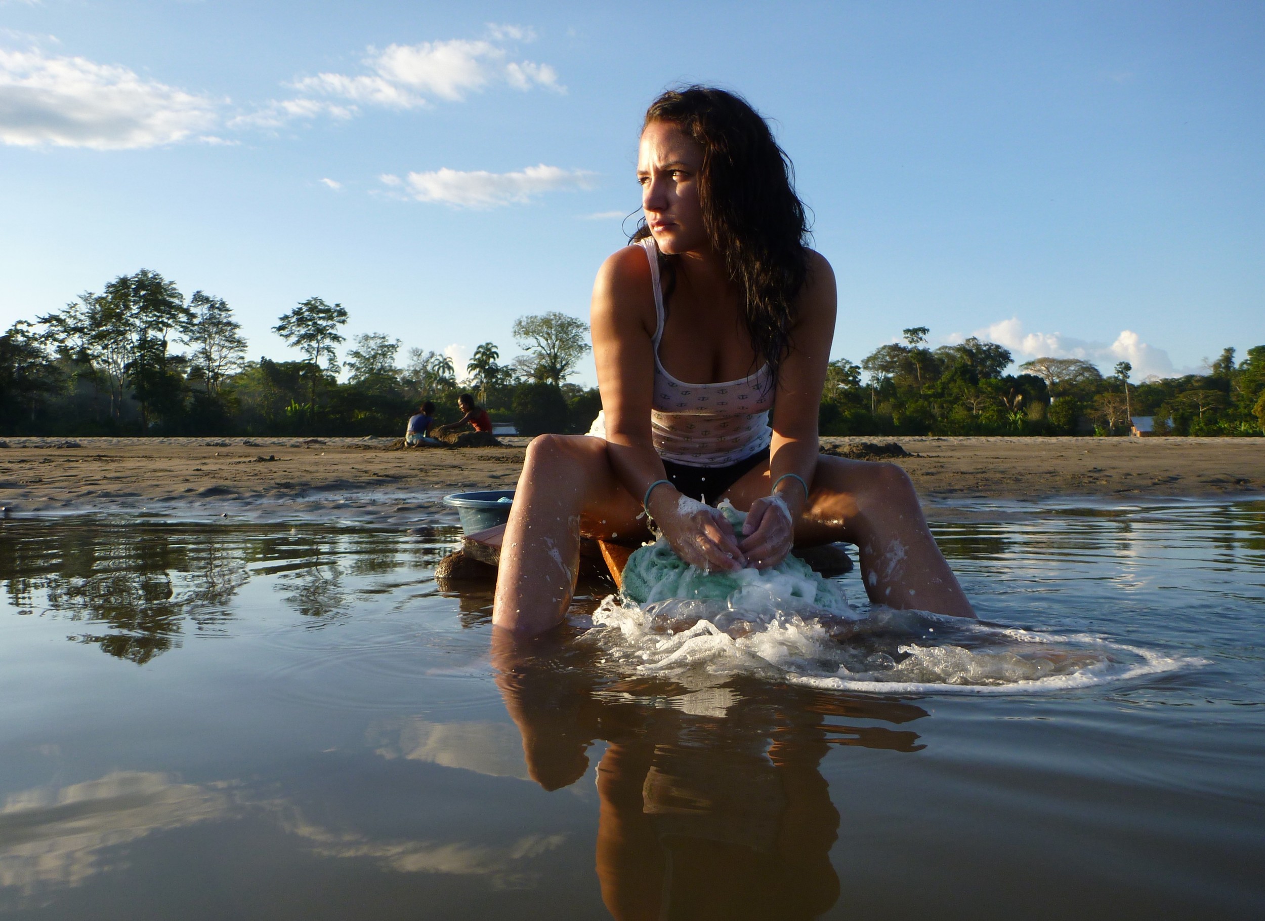 Sadie washing clothes in river - smaller.jpg