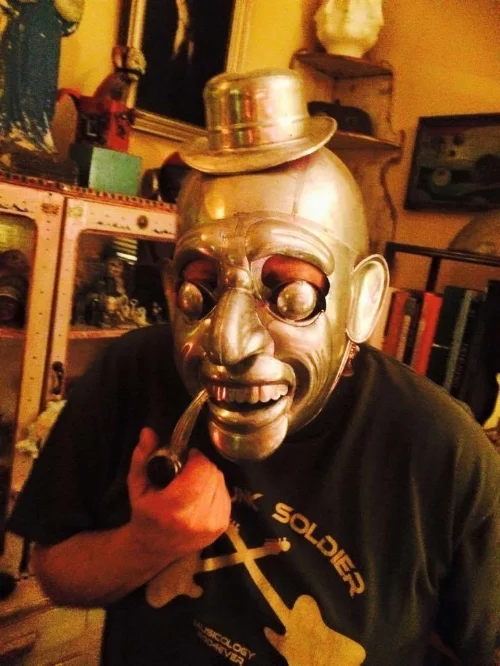 Here's Tabor now! That's not his real face...he's wearing a Bolivian mask made from tin.