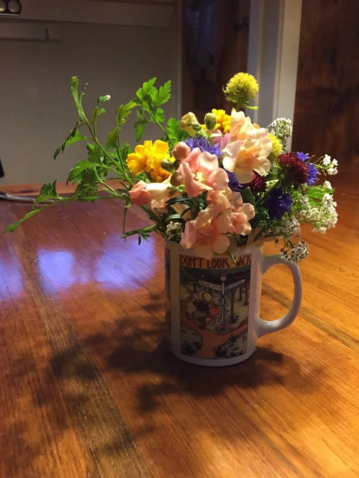flowers in cup.jpg