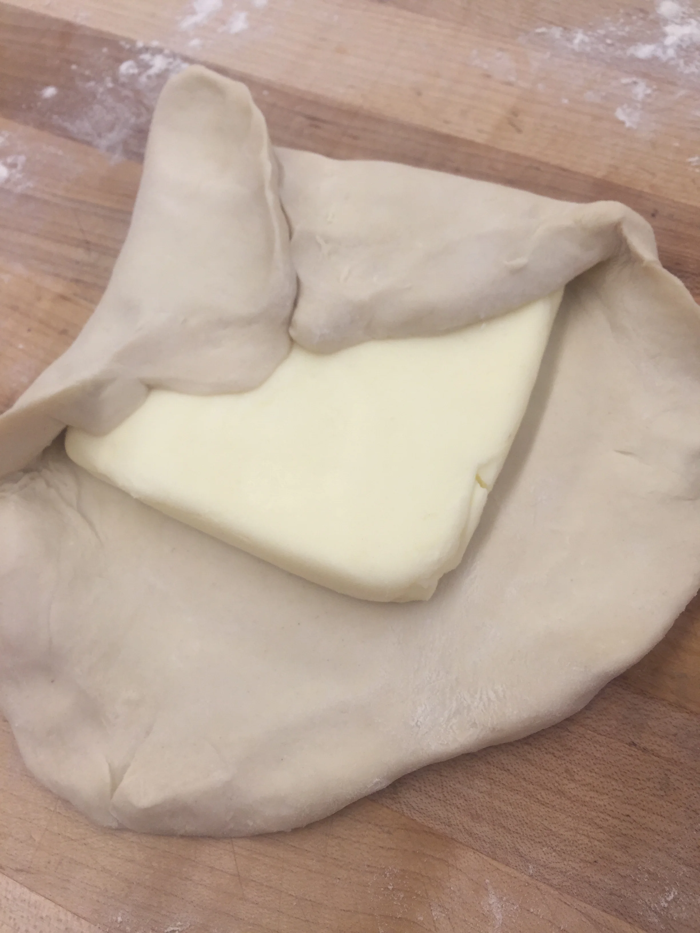 Enveloping the butter block with dough