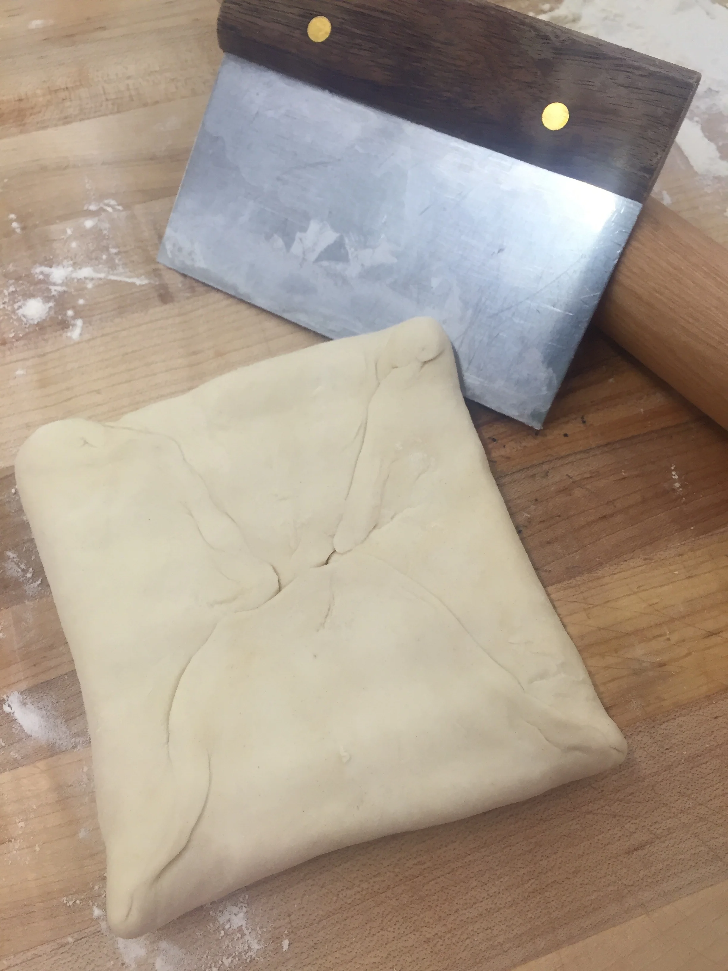 A perfect puff pastry dough package - no butter peeking out anywhere!